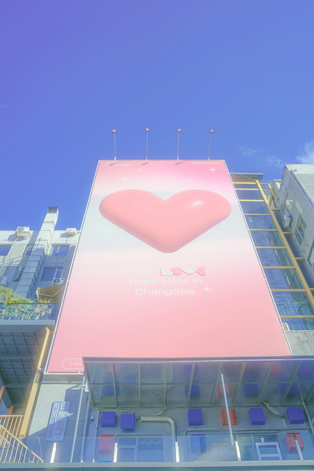 services-03 large-pink-heart-on-a-billboard-against-blue-sky-32r1vobb5mg